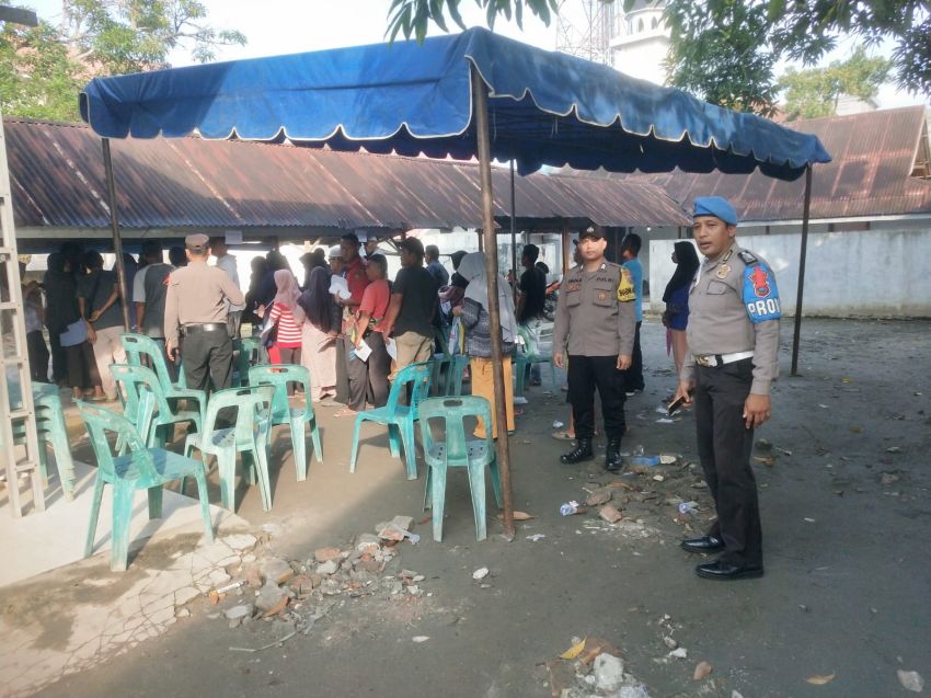 Polres Tanjung Balai Hadir Dalam Pendistribusian Cadangan Beras Pemerintah