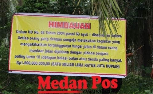 Polres Labuhanbatu Pasang Poster Himbauan Kamtibmas di Pulo Padang