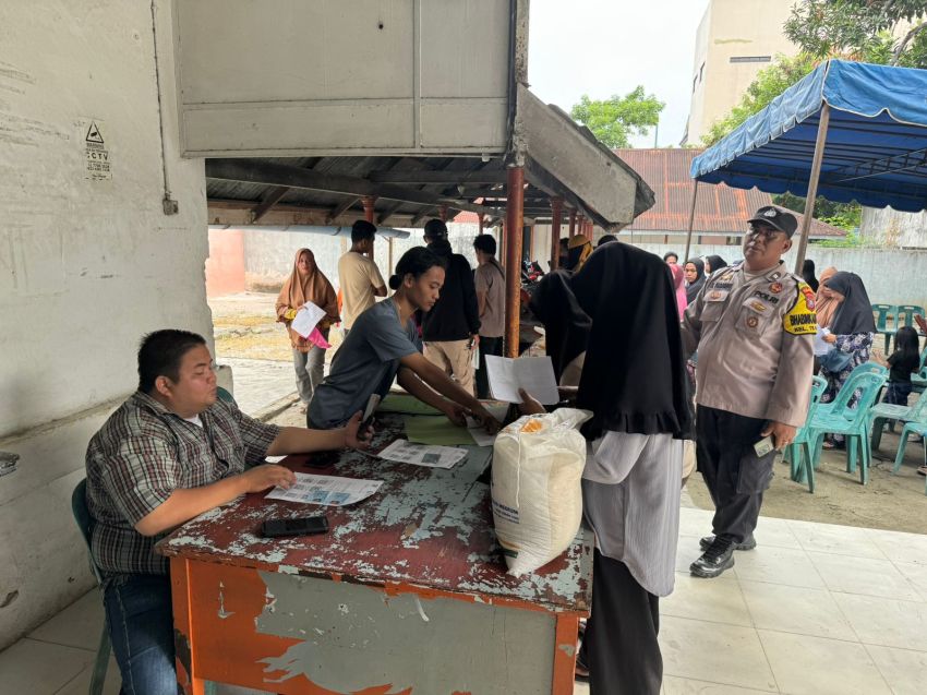Pastikan Kondusifitas Pada Penyaluran Beras, Polres Tanjung Balai Laksanakan Pengamanan